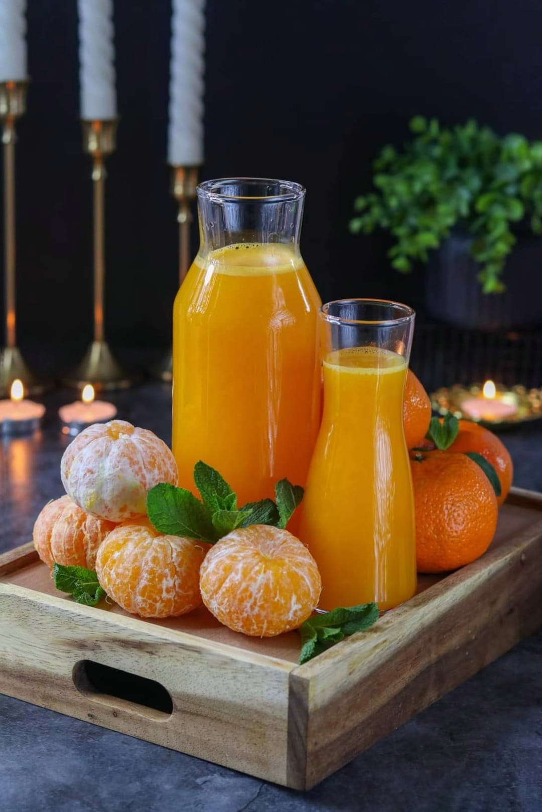 Tangerine Juice on a wooden tray